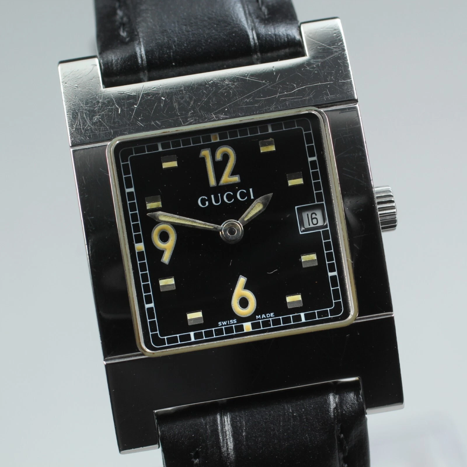 Montre femme Gucci 7700L noire argentée carrée acier inoxydable quartz
