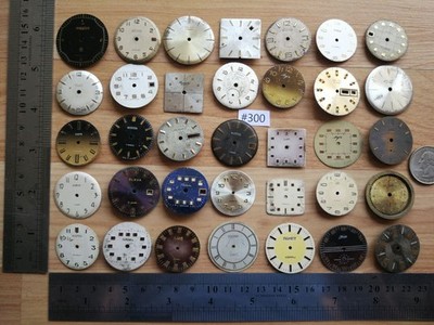# 300/ 40 Vintage/Antique Clock Faces for Repair/Parts/Altered Art.  Video.
