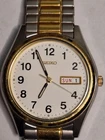 SEIKO VINTAGE MODEL 7N 43-9048 SS/BASE METAL BEZEL QUARTZ DATE/DATE RUNS WELL