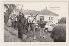 Villagers Aim Rifles High as Accordion Tunes Fill the Air in Festive Spirit Snap