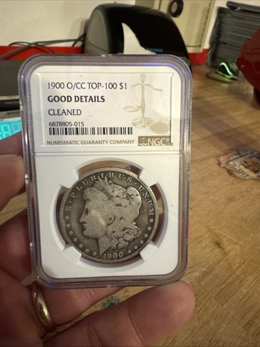 Morgan Silver Dollar O/CC Cleaned NGC Bullion Coin Carson City Overmint Error