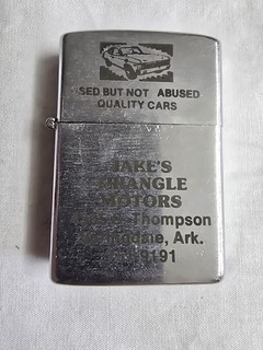 Encendedor abatible vintage Jake's Triangle Motors. RARO