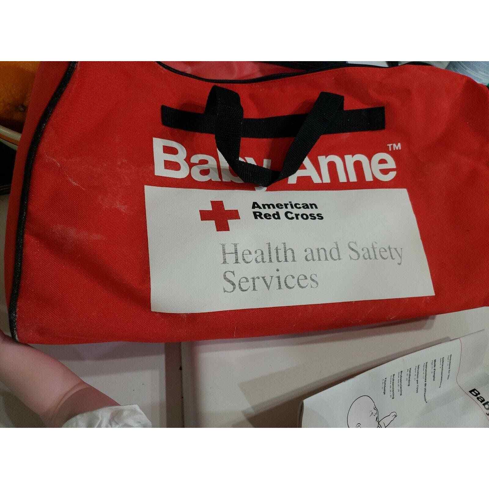 Laerdal adult male & Baby Anne CPR manikins set w/ books face Shields