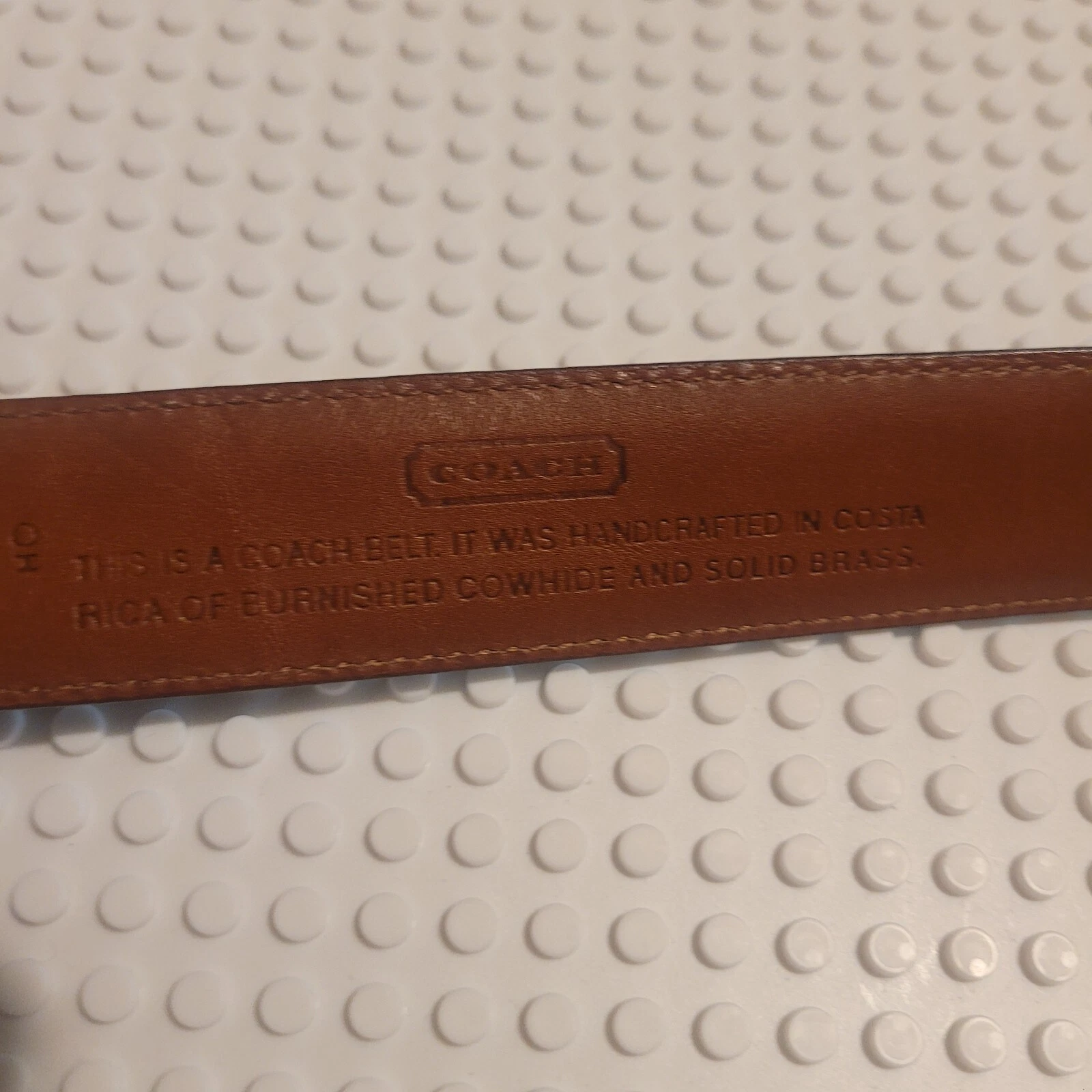 Cintura Coach nera in pelle bovina brunita fibbia in ottone massiccio misura 34