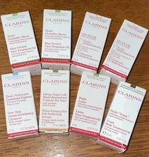 Lot Of 8 Various Travel Size Clarins Paris Products Face Oil Sunscreen Eye Firm