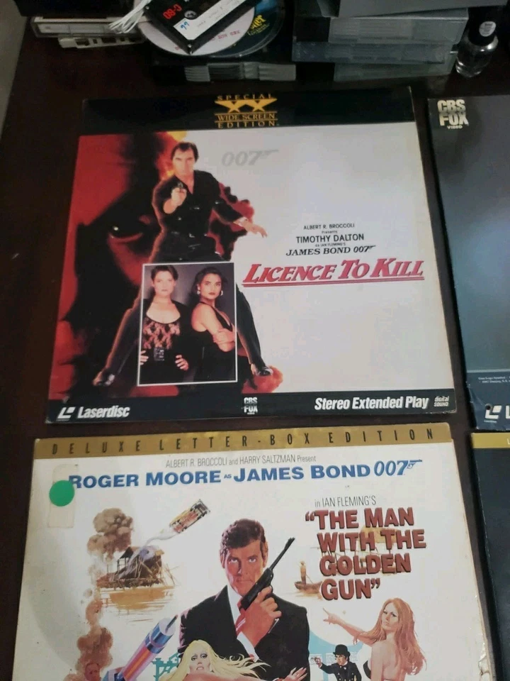 Lot of 4 James Bond Laserdiscs 007 Golden Gun GoldenEye License to Kill Y5 — 第 2/4 张图片