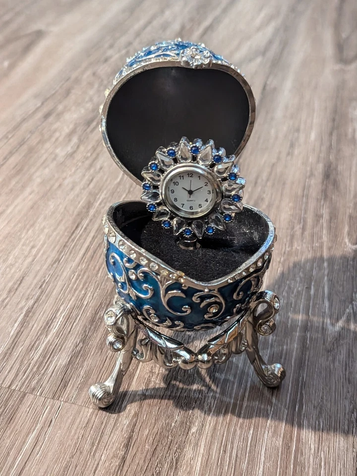 Reloj musical azul Biltmore para tu hogar interior huevo con joyas soporte música cuerda Foto 2 de 4