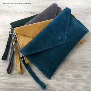 teal suede handbag