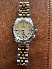 Seiko Prospex Alpinist Automatic 200m Ivory Dial Two-Tone Silver Gold Bracelet