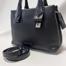 Borsa Michael Kors Rollins piccola in pelle nera con lucchetto a tracolla a...
