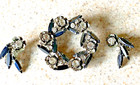 VINTAGE CLEAR & BLACK RHINESTONE BROOCH WITH MATCHING CLIP-ON EARRINGS — photo 1
