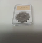 1888 O MORGAN SILVER DOLLAR, in holder, good condition.