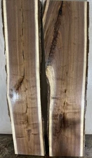 (2) live edge black Walnut Boards Kiln dried and planed 1.1/8”x9.5-12.5”x46”