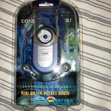 Coby Mini AM/FM DBBS CX-7 Pocket Radio With Earphones  Neck Strap New