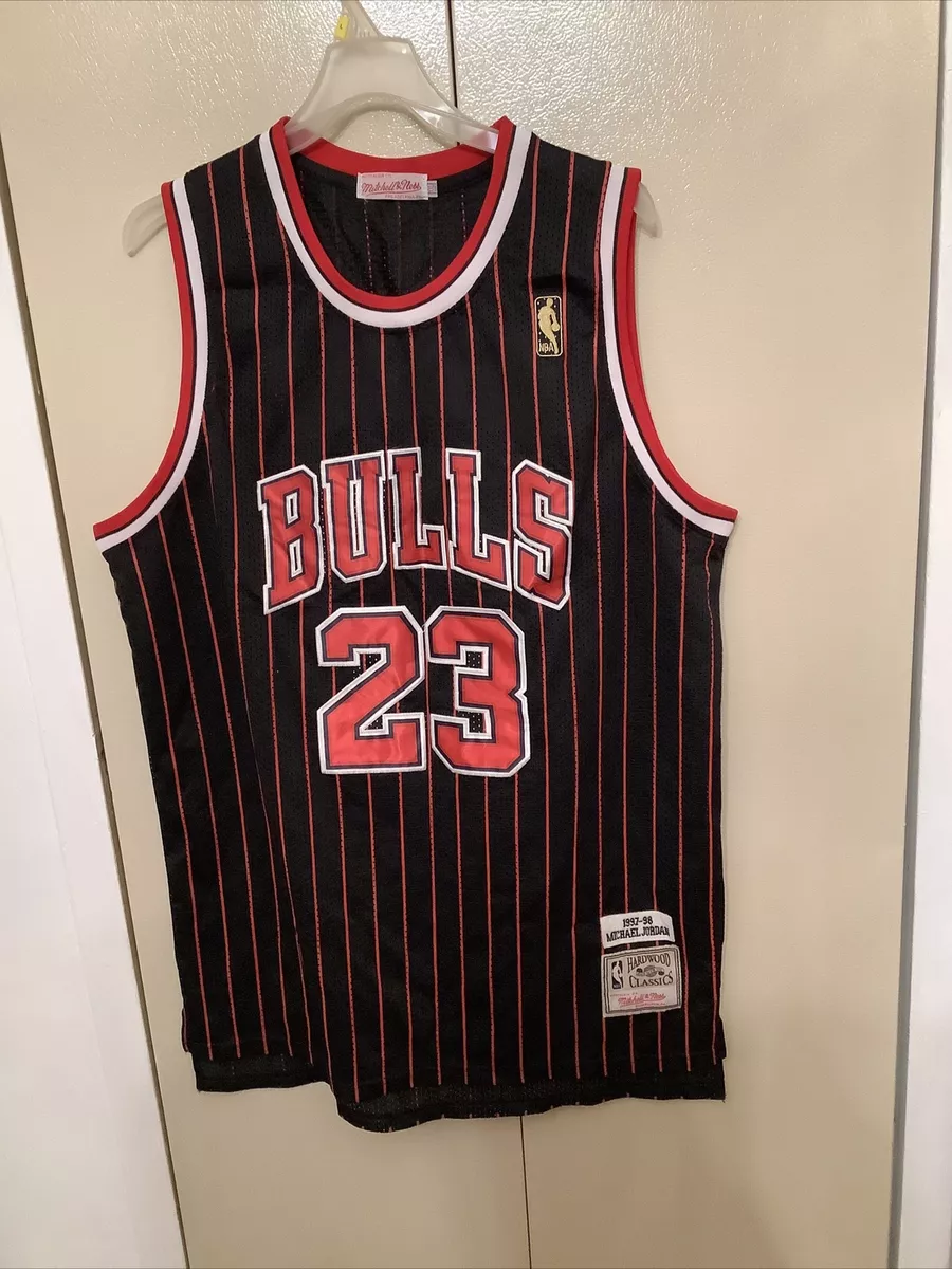 Detailed Look At Michael Jordan's 1996-97 Black Pinstripe Jersey By  Mitchell & Ness - Air Jordans, Release Dates & More