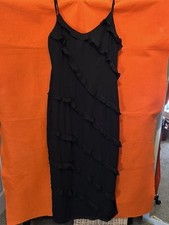 In the style, Maxi dress with frill detail.  Size 12 petite