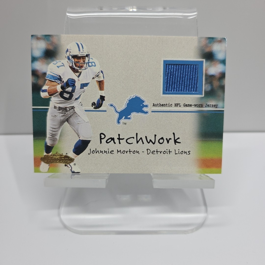 2001 Fleer Showcase #NNO Johnnie Morton Patchwork Detroit Lions 🔥 