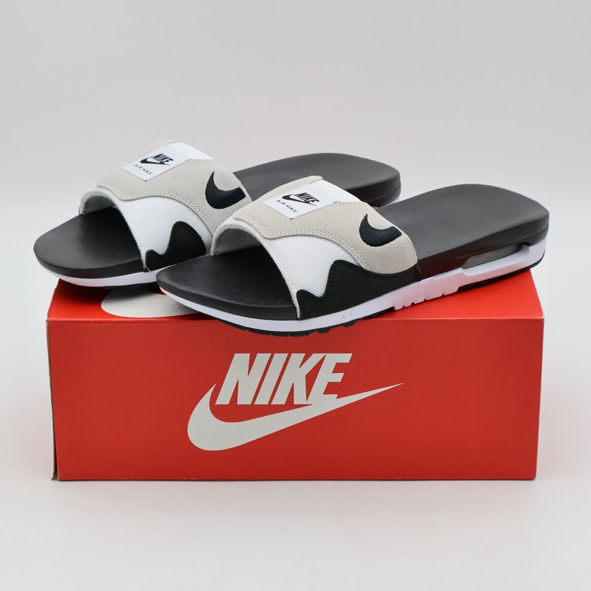 DH0295-102 Nike Air Max 1 Slide Light Neutral Grey and Black DH0295-102 Nike Air Max 1 Slide Light Neutral Grey and Black