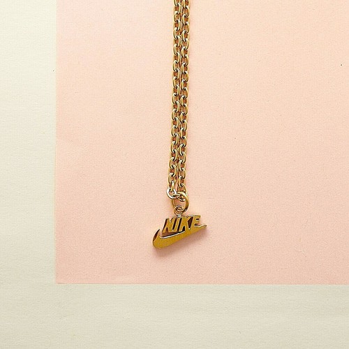 Gold stainless steel nike logo chain 