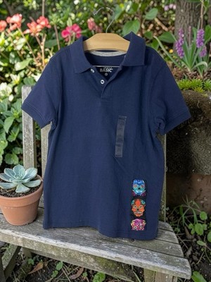 NWOT Simply Basic Navy Polo with Floral Skelton Patch Girls Size 8