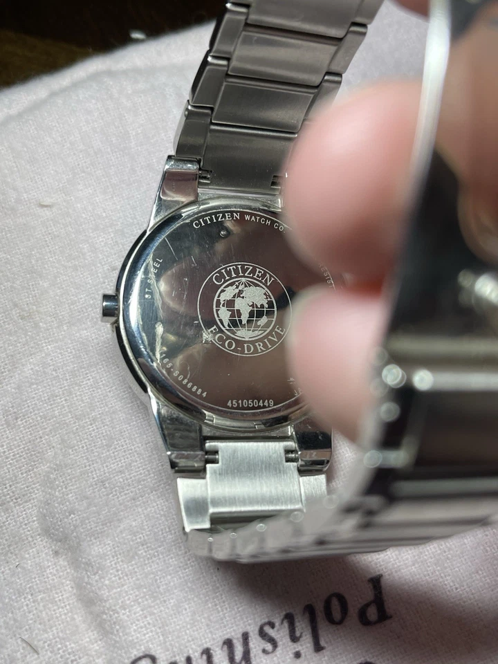 Citizen Eco-Drive esfera plateada J165-S086884 elegante cara lisa Foto 2 de 4