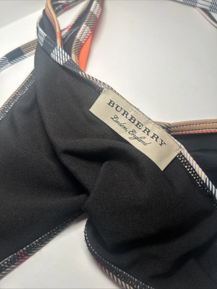 Parte inferior de bikini Burberry con tanga a cuadros grande, frente naranja y espalda negra Foto 4 de 4