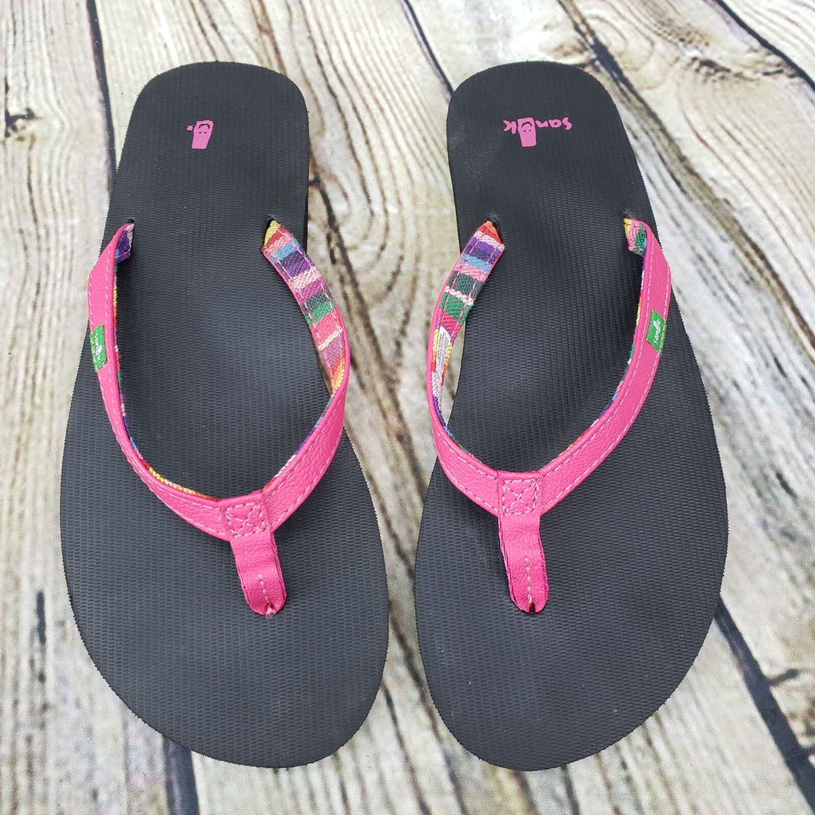 pink sanuk flip flops