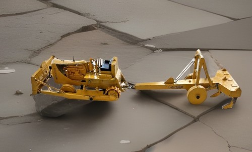 Ruehl Caterpillar D7 and tow behind ripper