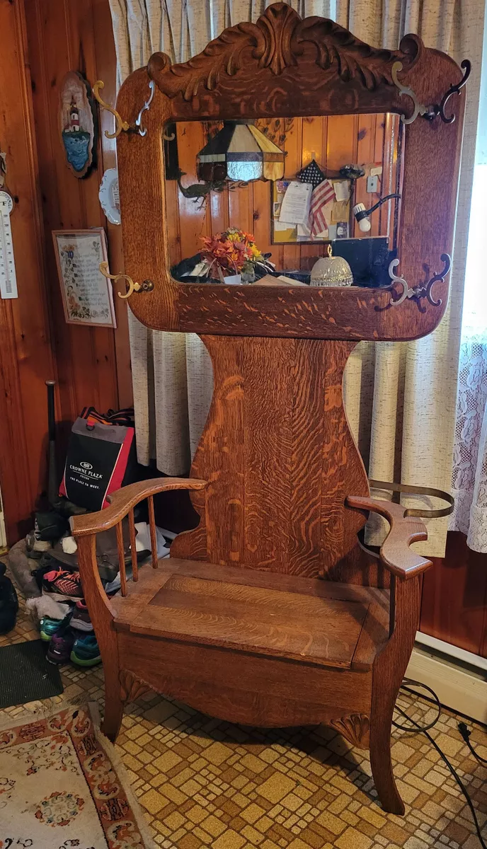 Antique hall bench with storage outlet