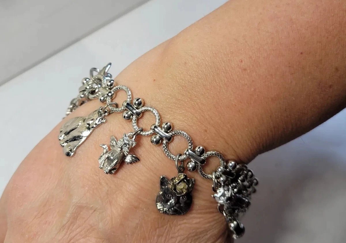 VINTAGE KIRKS FOLLY SILVER TONE KITTY CAT CHARM TENNIS BRACELET
