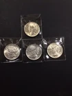 Lot of 4 AU/UNC Mixed Choice Silver Peace Dollars!