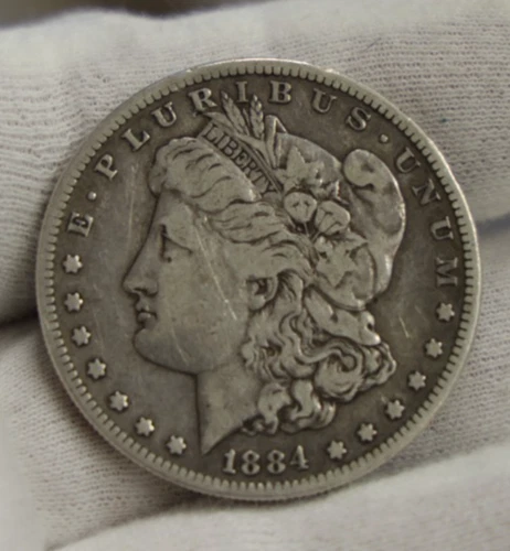 1884 S US Morgan Silver Dollar $1 Fine (Cleaned,Scratch)