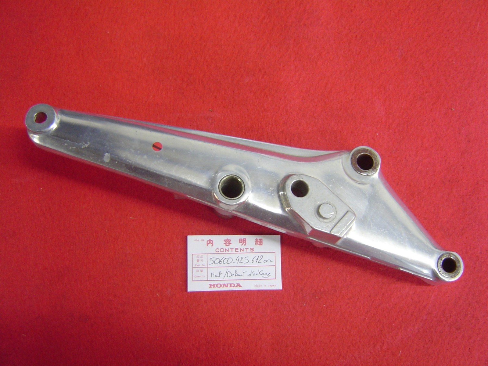 Support platine repose-pied droit CB750KA métallique avec défauts