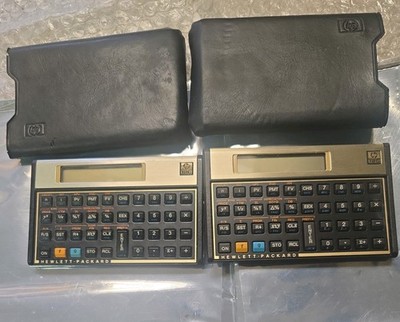 2 Vintage Hewlett Packard HP 12C  Financial Calculators W/Sleeves FREE SHIPPING 