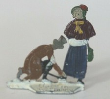 Vintage Heinrichsen German Flat Lead Man helping Woman Skater figure, Christmas