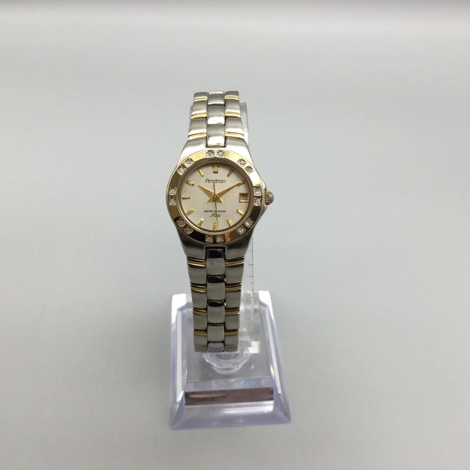 Reloj Armitron Mujer 23mm Plata Oro Dos Tonos Fecha Batería Nueva 6.75" Foto 2 de 4