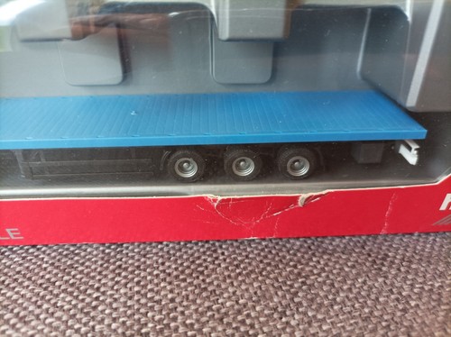 Herpa H0 1:87 IMBALLO ORIGINALE - 303262 MB Actros semirimorchio pianale "Bautrans/Felbermayr" - Foto 6 di 7