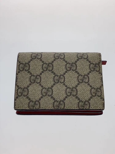Portefeuille GUCCI Plié GG Supreme Compact Cerise PVC Beige Motif Total Occasion