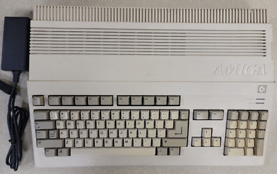 Commodore Amiga A500 Computer, Workbench 1.2 floppy, Power supply & 2.5MB RAM