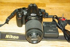 Nikon D3000 DSLR Camera with Nikon 55-200mm f4-5.6 VR  Lens + Nikon charger