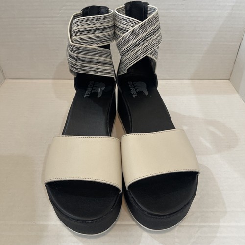 Sorel Cameron flache Keilsandalen überkreuzte Reißverschlüsse schwarz und hellbraun 9,5 M