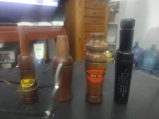 Lot of 4 Game Calls. 1 Thomas Deer, PS Olt Moose, Ohman Duck, Faulk's Crow Calls