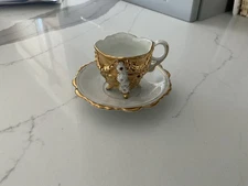 Vintage white and gold tea cup, and saucer from Germany