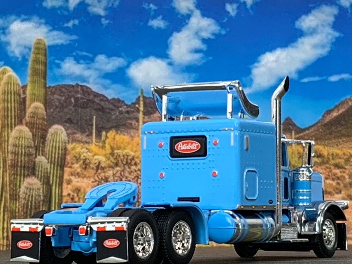 1/64 DCP BABY BLUE PRIDE & CLASS PETERBILT 389 63