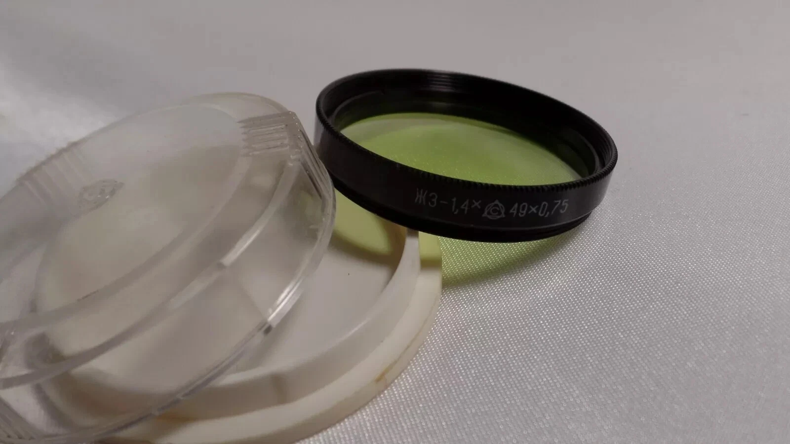 a Yellow-Green 1.4x LZOS 49x0.75 Vintage Light Filter 49mm 1,4x for LENS 1251