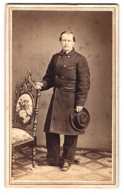 Photograph portrait gentleman in frock coat with hat 