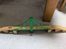 The IKEA wooden railway bridge and rail set Thomas track width are the same, so