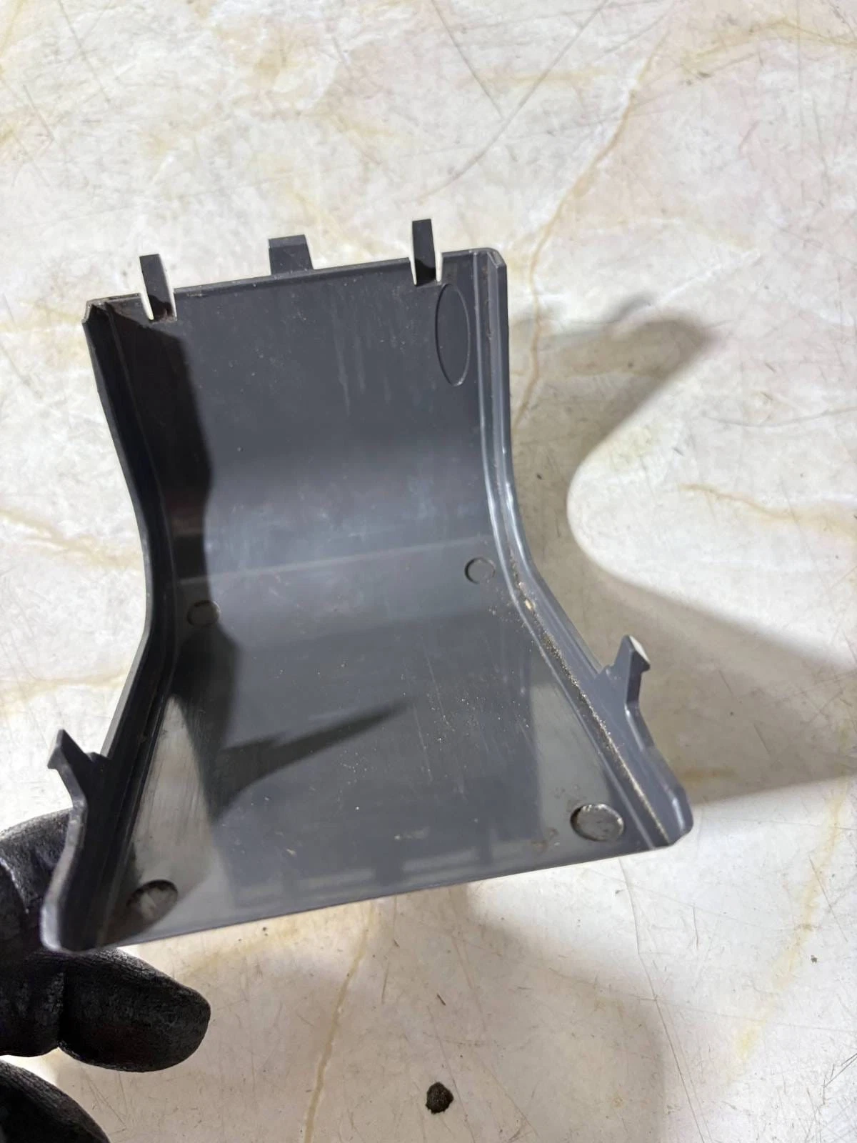 Rear mounting tabs of Volkswagen Golf Plus 5M centre console insert