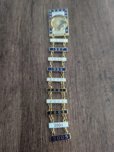 Poole Pirates Speedway badge with year bars 1996-2005 gold back