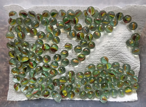 1- Dairy-Milk By Heritage Bottle with Marbles. Peanut size Marbles.